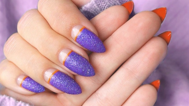 Purple and orange peekaboo manicure