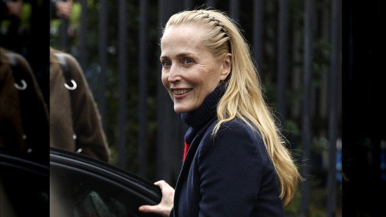 Gillian Anderson leaves the Miu Miu FW 26/27 show.