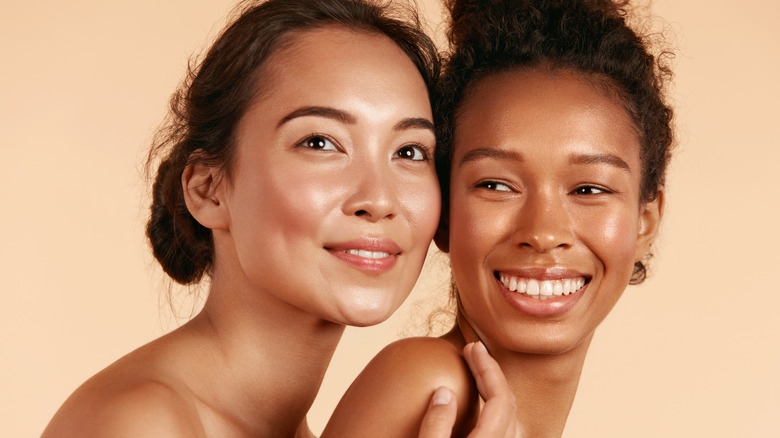 Two women smiling together