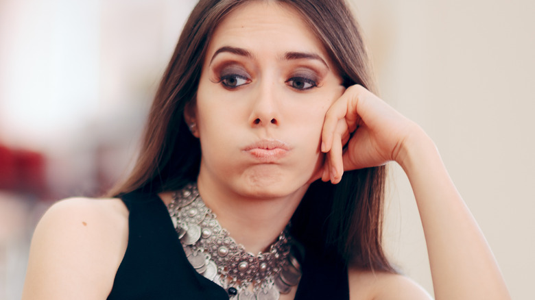 woman on couch stood-up