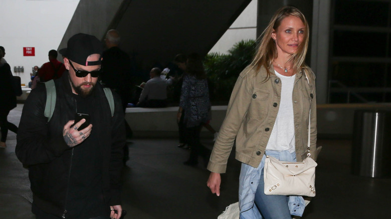 Cameron Diaz and Benji Madden walking in LAX. on August 31, 2015