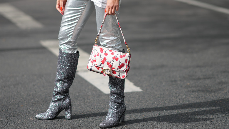 Girl wearing glittery boots