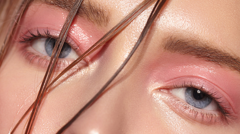 close up of glossy pink eyeshadow