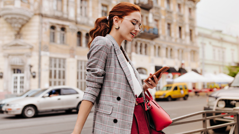 Woman walking in a blazer