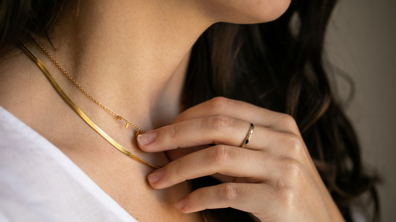 Woman wearing gold jewelry