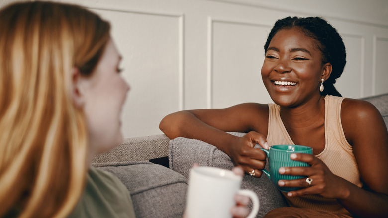 friends talking on sofa