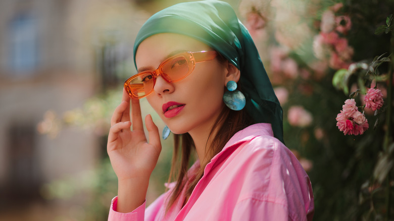 woman wearing big earrings