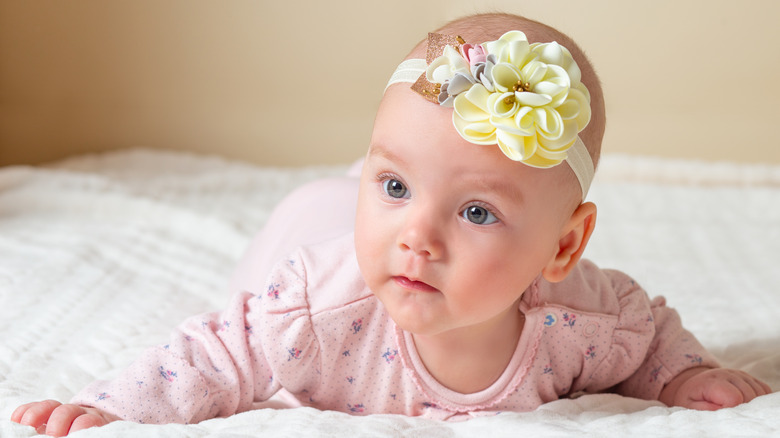 Baby girl with a floral headband