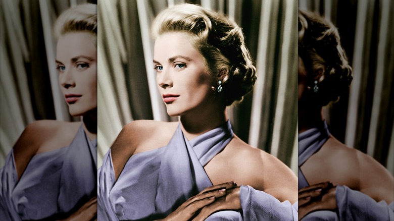 Grace Kelly posing in a lavender halter-top dress with delicate earrings.