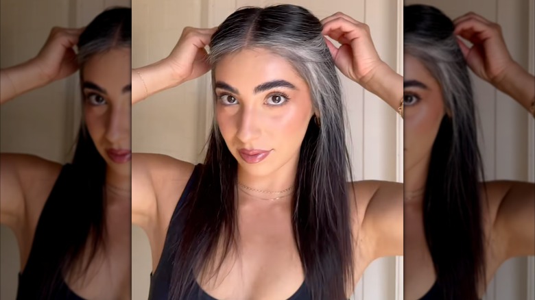 A young woman with gray money piece hair