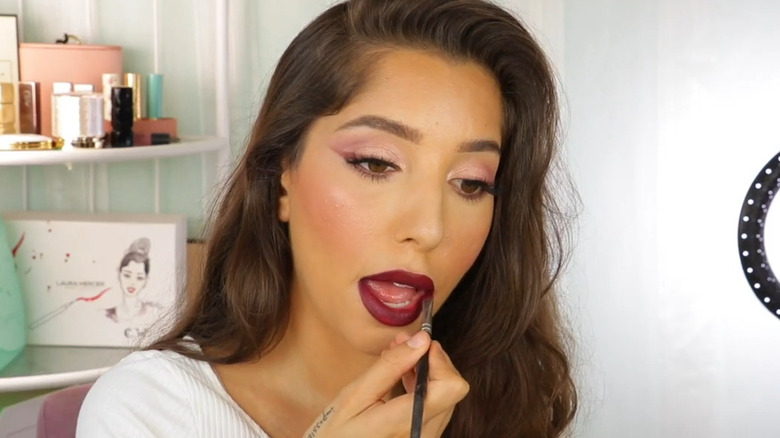 Burgundy lipstick with lip brush