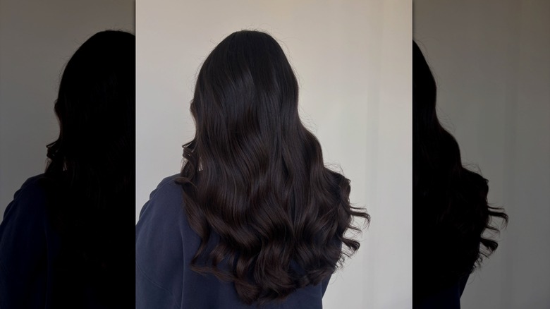 A woman with dark coffee colored hair