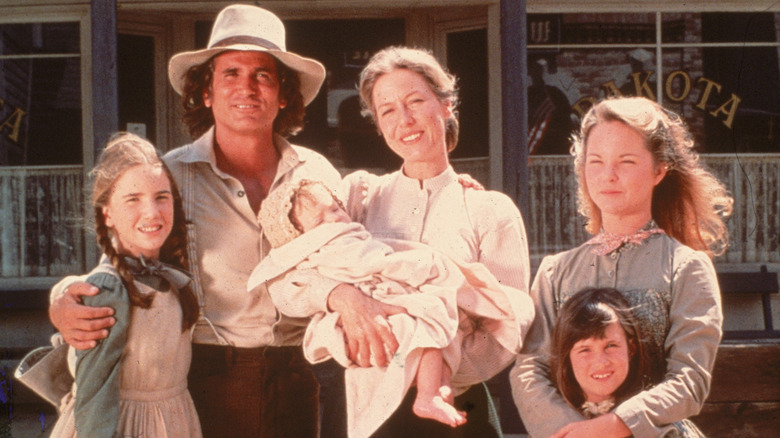 The Ingalls family posing together on the original "Little House on the Prairie."