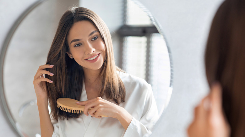 Woman brushing her hair
