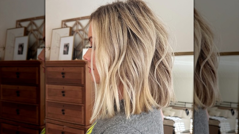 A person with an A-line textured shoulder-length cut