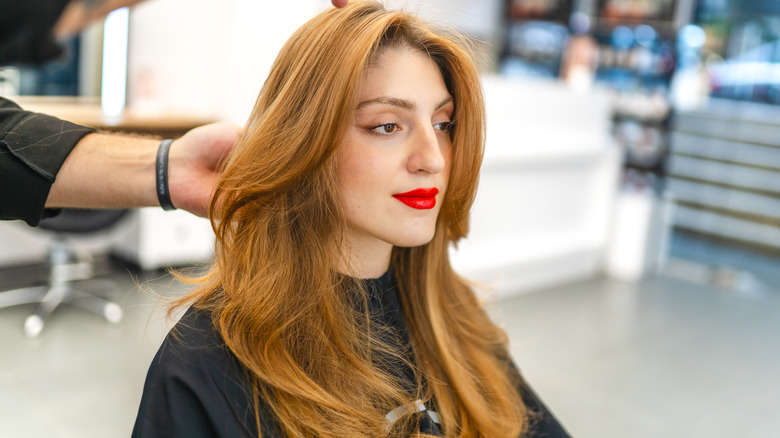 A woman with a layered haircut