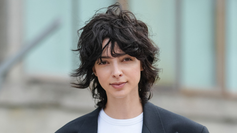 A woman with a shag haircut