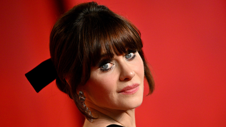 Zooey Deschanel bangs and bow hairstyle