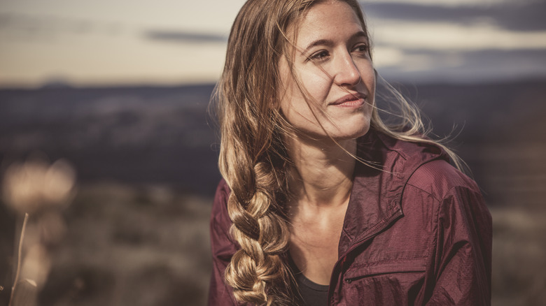 A woman with a braid to the side