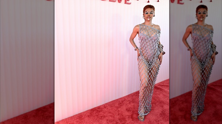 Teyana Taylor wearing a netted dress and funky accessories at Coachella
