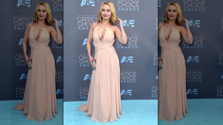 Hayden Panettiere wearing a light-pink gauzy dress with a chest cutout in January 2016.