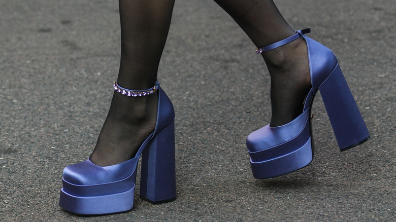 A woman wearing outdated chunky platforms