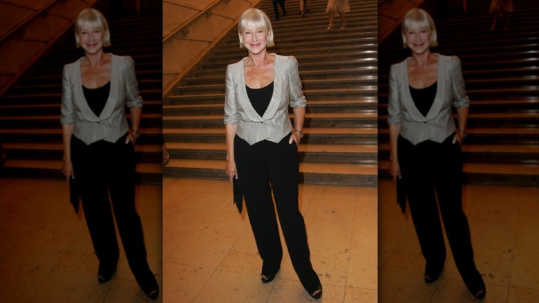 Helen Mirren poses outside the Armani show at Paris Fashion Week