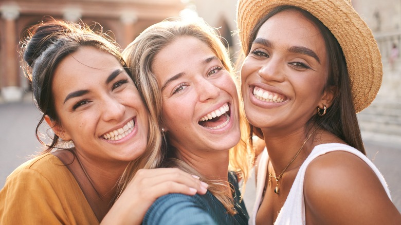 Three women taking a selfie