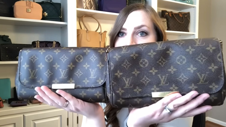 Mama Beech holding 2 LV bags, one fake one real