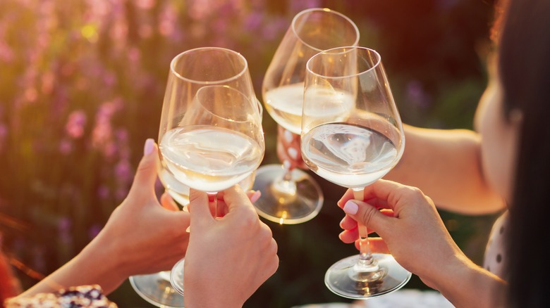 People toasting with wine