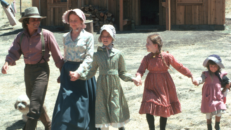 A scene of the Ingalls family walking together from Little House on the Prairie