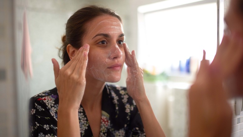 Woman washing face