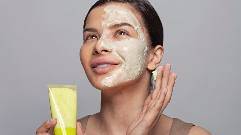 woman with green mask on face