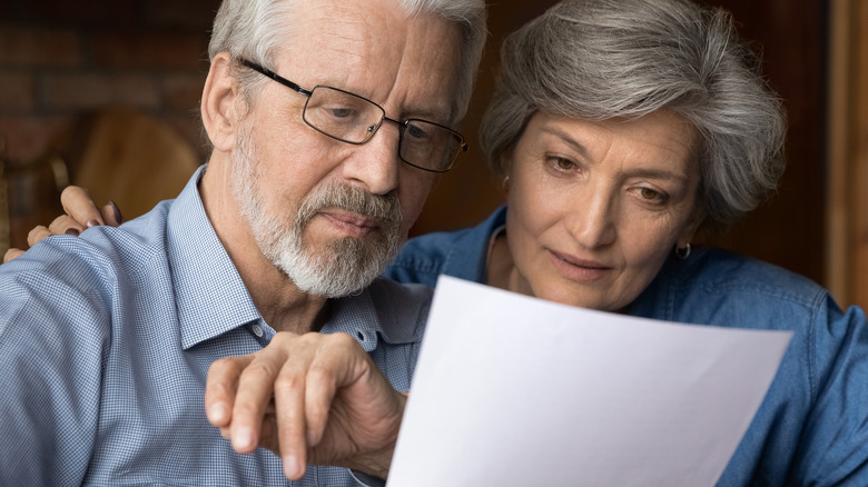 couple looking at a contract