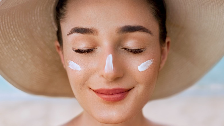 Woman wearing sunscreen