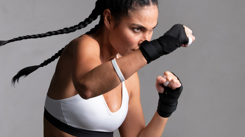 middle aged female boxer boxing