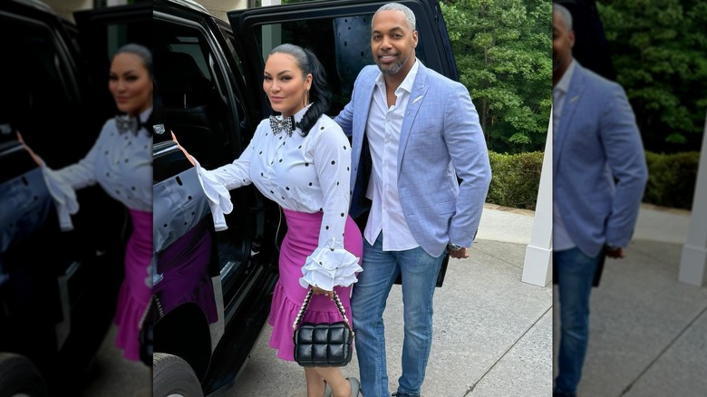 Egypt Sherrod wearing a polka dotted white-and-black blouse, purple skirt, and a bowtie about to step into her car