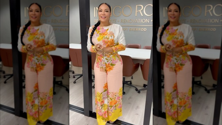 Egypt Sherrod wearing a beautiful floral pantsuit at Indigo Road's office