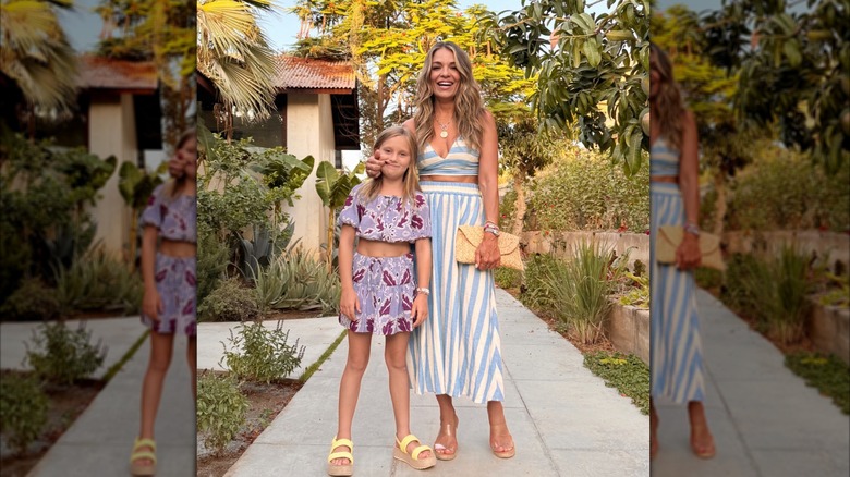 Sabrina Soto and her daughter posing in tropical-inspired two-piece sets outside in a sunny location.
