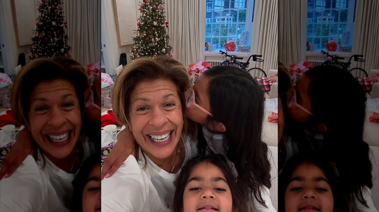 Hoda Kotb smiles for a selfie with two children on Christmas