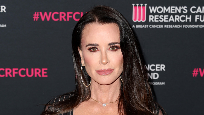 Kyle Richards wearing hoop earrings