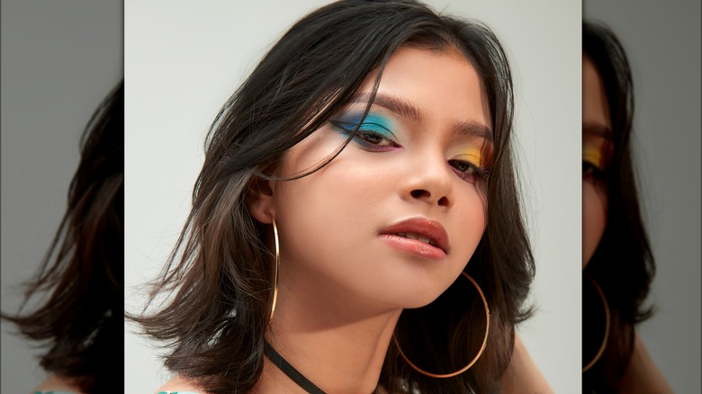 Woman wearing colorful eye makeup