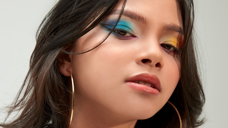 Woman wearing colorful eye makeup