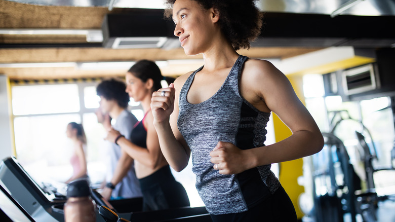 Women running on treadmills