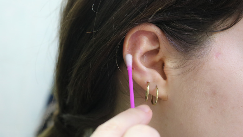 Cleaning ear piercing