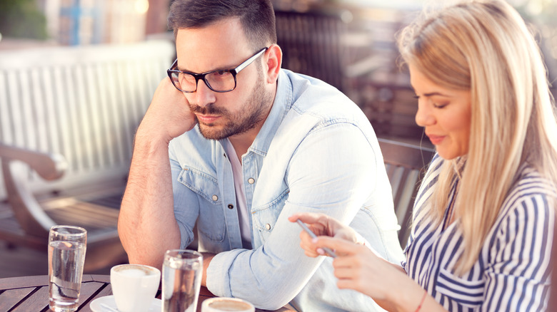 rude woman on phone at lunch