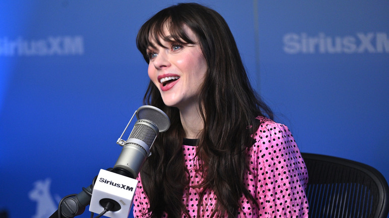 Zooey Deschanel visits the Morning Mash Up at SiriusXM Studios on December 10, 2025 in New York City
