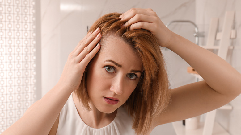 woman suffering from alopecia 