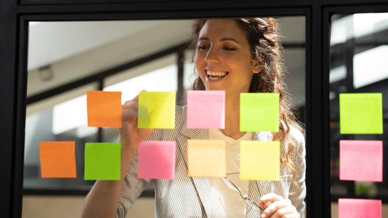 woman with phone and daily planner