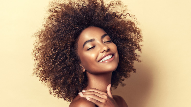 Black woman with curly hair